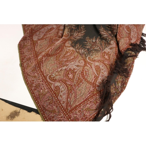 429 - Shawl with black ground having Paisley pattern border, single sided, holed, 166cm x 166cm.