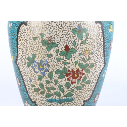 461 - Antique Chinese Cloisonné on pottery vase, the blue and white ground with foliate and leaf de... 