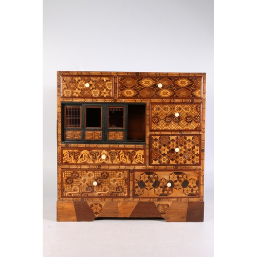 501 - Japanese marquetry tabletop cabinet with seven drawers and sliding panel doors, 46cm x 45cm.