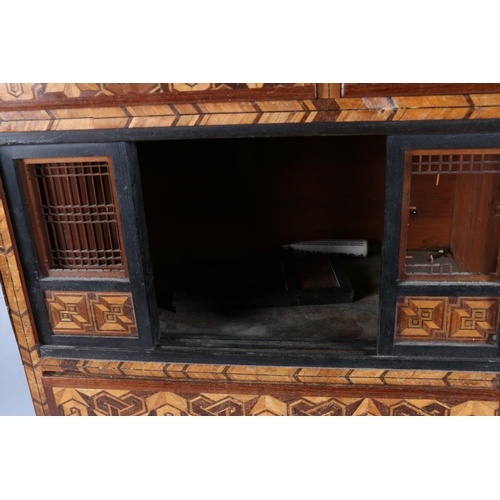 501 - Japanese marquetry tabletop cabinet with seven drawers and sliding panel doors, 46cm x 45cm.