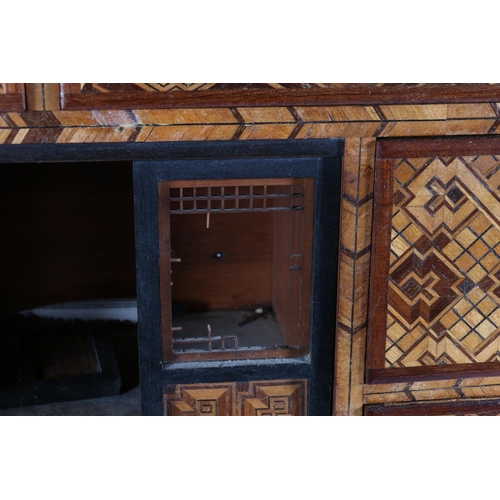 501 - Japanese marquetry tabletop cabinet with seven drawers and sliding panel doors, 46cm x 45cm.