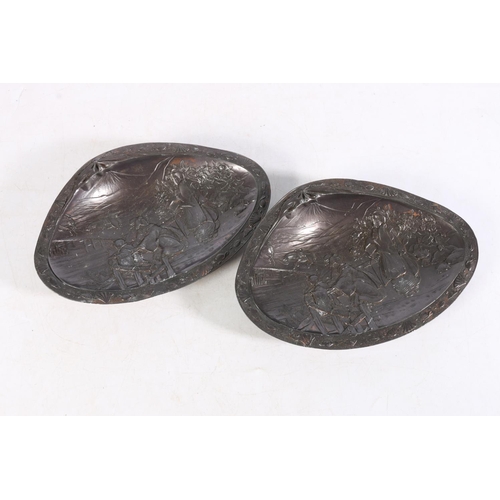 502 - Pair of Japanese clam shaped dishes with geisha and mount Fuji decoration to the body, 21cm.