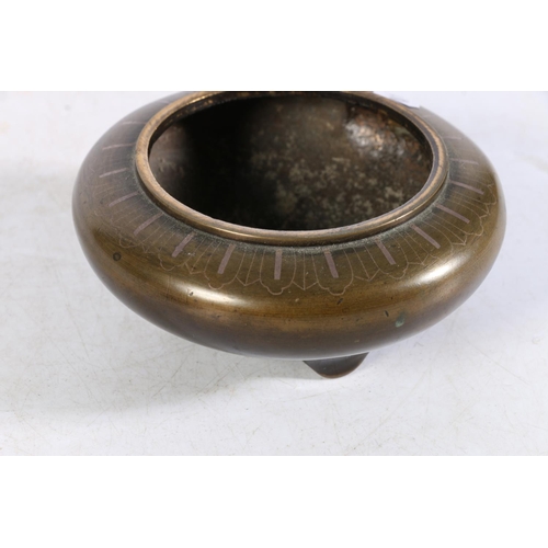 504 - Oriental bronze censor of squat form with pierced bronze lid and inlay to top of main body, 6.5cm ta... 