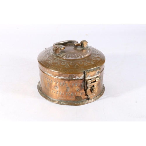 512 - 19th Century Indian hammered copper betel nut set in box, with carrying handle, 20cm diameter.