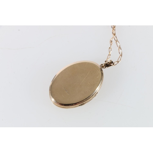 71 - 9ct gold foliate locket on 9ct gold chain, 11.2g, and another 9ct gold locket on yellow metal chain,... 