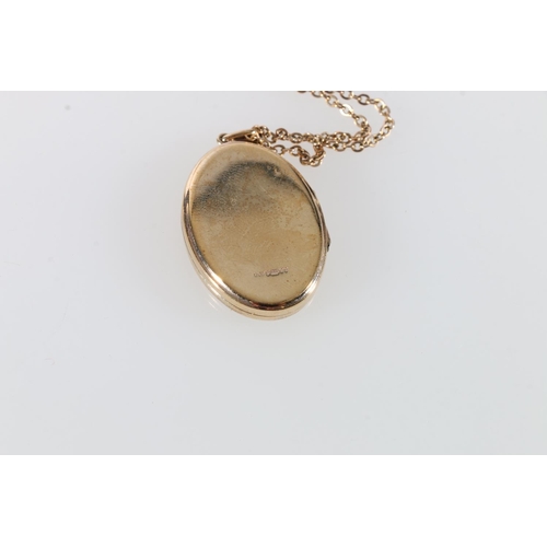 71 - 9ct gold foliate locket on 9ct gold chain, 11.2g, and another 9ct gold locket on yellow metal chain,... 