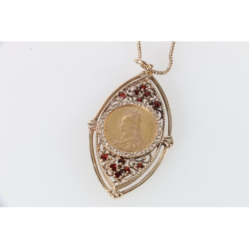 77 - 1892 sovereign in red stone set yellow metal pendant, on 14ct gold chain, 25.2g gross.