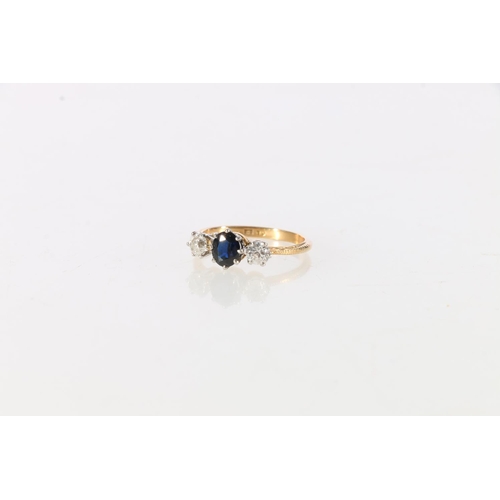 84 - Gold, diamond and sapphire three stone lady's ring, the central sapphire flanked by two diamonds, ma... 