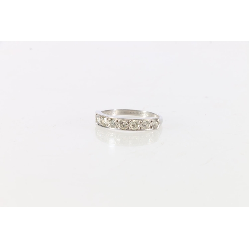 92 - Platinum and diamond eight stone half eternity rings, 'Jack to Maimie 13/2/64, size R, 4.1g.