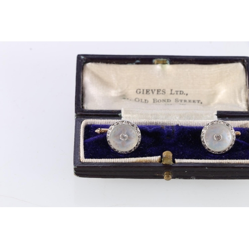 95 - Pair of 9ct gold diamond and mother-of-pearl set dress cufflinks, 3.9g in Grieves Ltd, Old Bond Stre... 