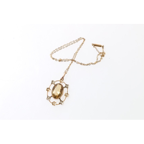 104 - 9ct gold seed pearl and citrine pendant on 9ct gold necklace, with barrel closure, 5.5g.