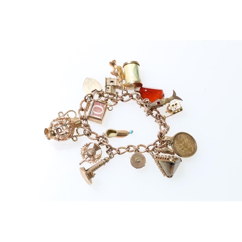 105 - 9ct gold curb link charm bracelet with fifteen dependant charms to include a 1906 half sovereign, a ... 