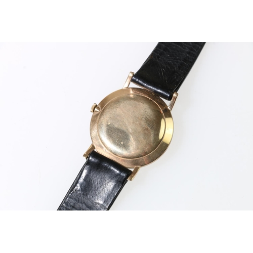 125 - 9ct gold gent's Cyma wristwatch, on leather strap.