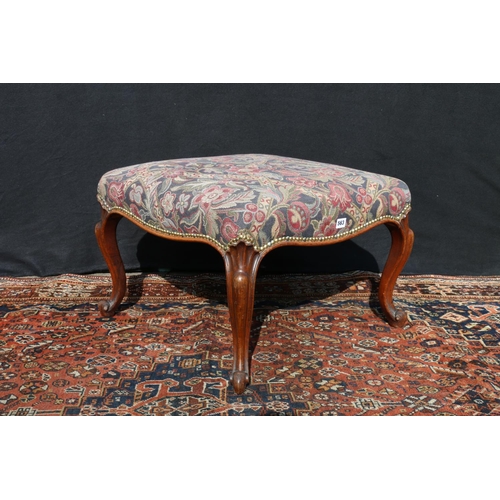 563 - Antique French style footstool, upholstered in floral patterned fabric, raised on carved rosewood ca... 