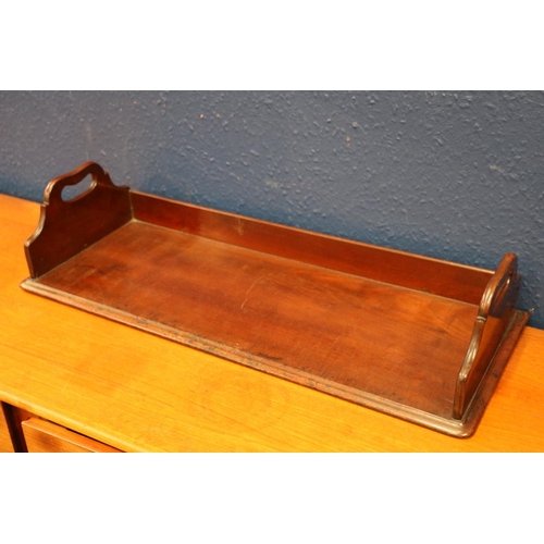 564 - Antique mahogany twin-handled serving tray with ledge-back, 70cm long.