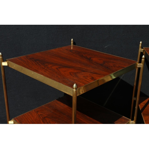 566 - Pair of contemporary brass and rosewood veneered two-tier side tables, the undersides signed C B '42... 