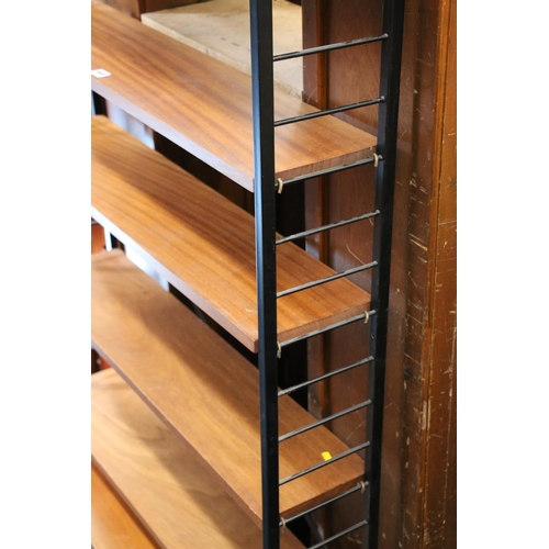 569 - Mid-century teak and metal modular shelving unit, in the manner of Staples Ladderax, 200cm high.