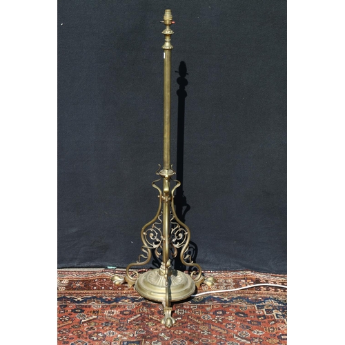 571 - Art Nouveau brass telescopic standard lamp, raised on paw supports, the underside with reg. no. 4108... 