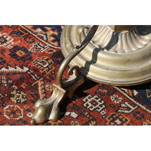 571 - Art Nouveau brass telescopic standard lamp, raised on paw supports, the underside with reg. no. 4108... 