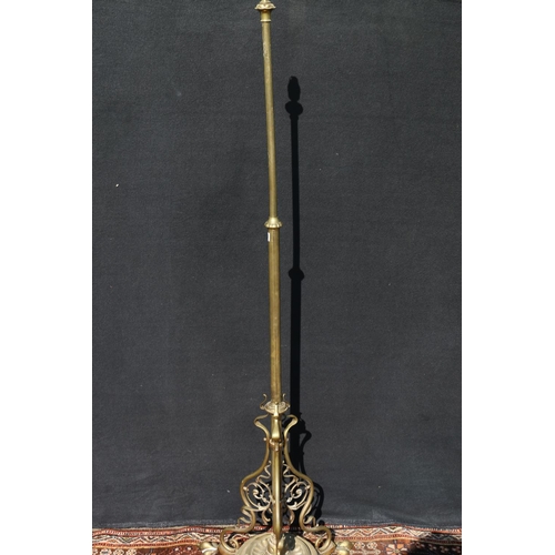 571 - Art Nouveau brass telescopic standard lamp, raised on paw supports, the underside with reg. no. 4108... 