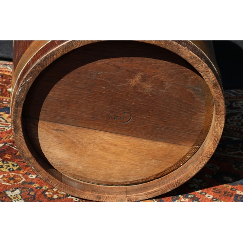 574 - Coopered oak brass bound peat bucket, with maker's roundel for R A Lister & Co. Ltd, 33cm high.