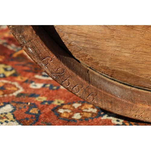 574 - Coopered oak brass bound peat bucket, with maker's roundel for R A Lister & Co. Ltd, 33cm high.