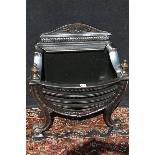 575 - Chromed cast metal fire basket of classical design, upon cabriole supports, terminating in whorl fee... 