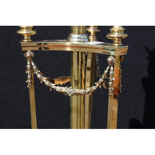 588 - Art Nouveau brass telescopic standard lamp, raised on three paw feet, having swag decoration, 140cm ... 