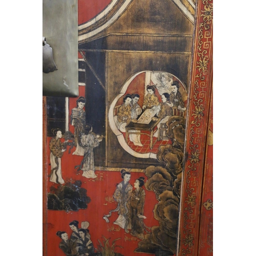 592 - Oriental lacquered two door wardrobe, decorated with figures in a pavilion and traditional scenes, h... 