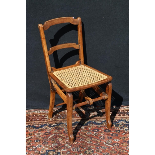 596 - Late Victorian folding chair, having single caned bergere seat.