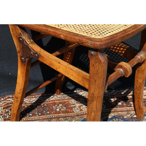 596 - Late Victorian folding chair, having single caned bergere seat.