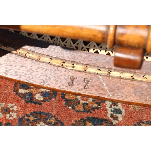 596 - Late Victorian folding chair, having single caned bergere seat.