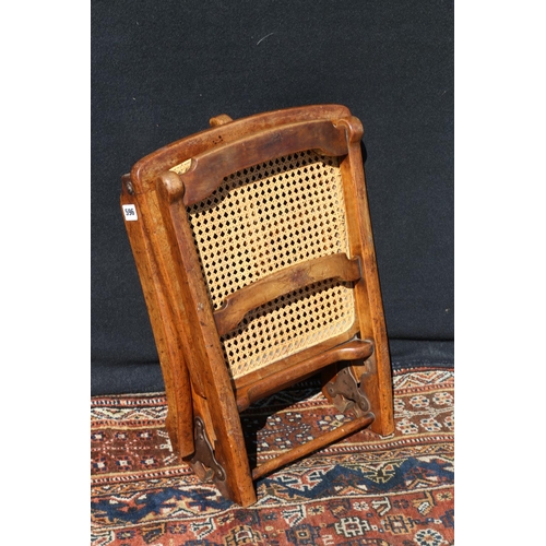 596 - Late Victorian folding chair, having single caned bergere seat.