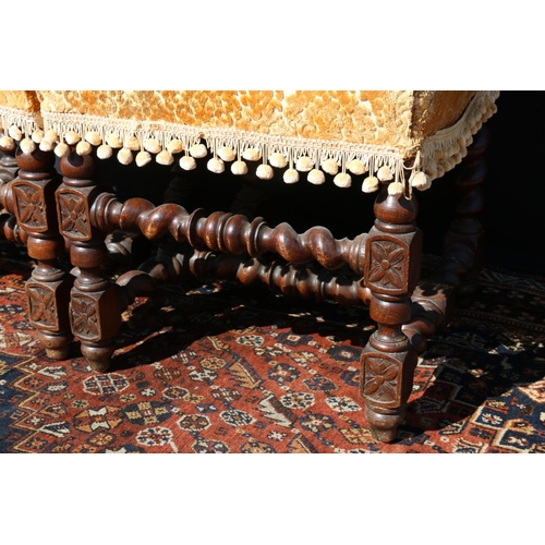 598 - Pair of carved oak Elizabethan style side chairs, the top rail modelled as a pair of birds and fruit... 