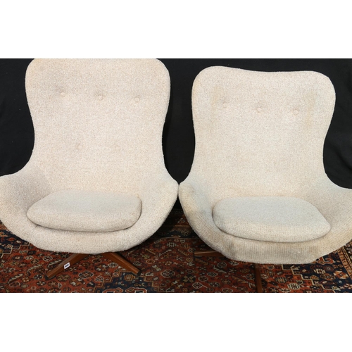 606 - Pair of mid century egg style chairs in the manner of Arne Jacobsen.