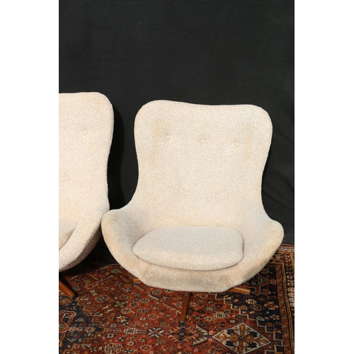 606 - Pair of mid century egg style chairs in the manner of Arne Jacobsen.