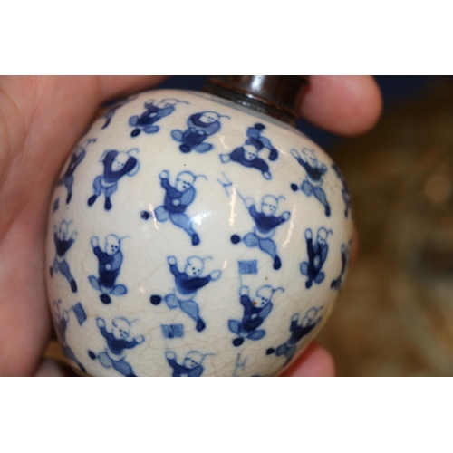 514 - Pair of 19th Century Chinese miniature spherical blue and white vases decorated with the 100 childre... 