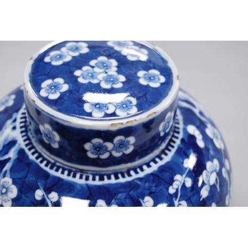 244 - Chinese Kangxi-style oviform vase and cover with all over white prunus decoration on a blue ground, ... 