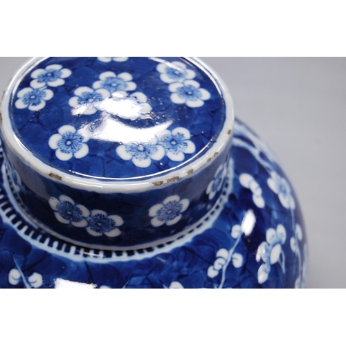 244 - Chinese Kangxi-style oviform vase and cover with all over white prunus decoration on a blue ground, ... 