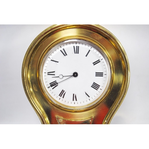 160 - Edwardian brass-cased mantel clock of balloon shape, the white enamel dial with Roman numerals above... 