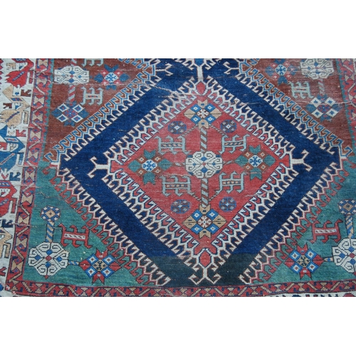 314 - Qashqai-style hand-knotted rug with three geometric medallions to the centre and further geometric m... 