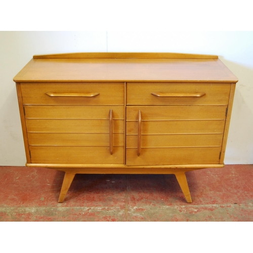 322 - Ernest Gomme 1950s dining room suite comprising a two-door sideboard, dining table and six chairs, l... 