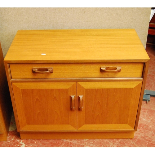 323 - G Plan 1960s teak modular display unit comprising three matching cabinets, each with two glazed door... 