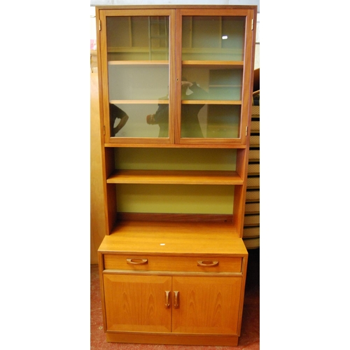 323 - G Plan 1960s teak modular display unit comprising three matching cabinets, each with two glazed door... 