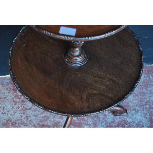 324 - George III style mahogany dumb waiter with two graduated saucer tiers, on carved column and tripod s... 