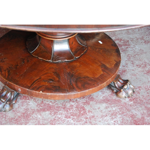 346 - Early 19th century Irish-style mahogany breakfast table, the circular snap action top on a cylindric... 