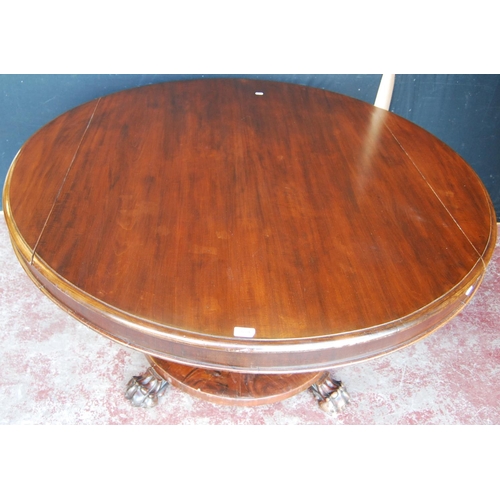 346 - Early 19th century Irish-style mahogany breakfast table, the circular snap action top on a cylindric... 