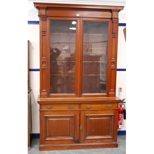 347 - Late Victorian mahogany library bookcase, the shaped cornice above two large glazed doors enclosing ... 