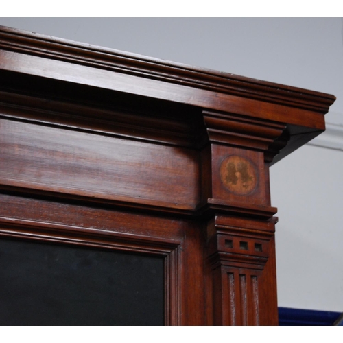 347 - Late Victorian mahogany library bookcase, the shaped cornice above two large glazed doors enclosing ... 