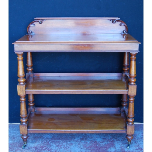 349 - Victorian mahogany buffet table with scroll pediment above three open tiers, on turned column suppor... 